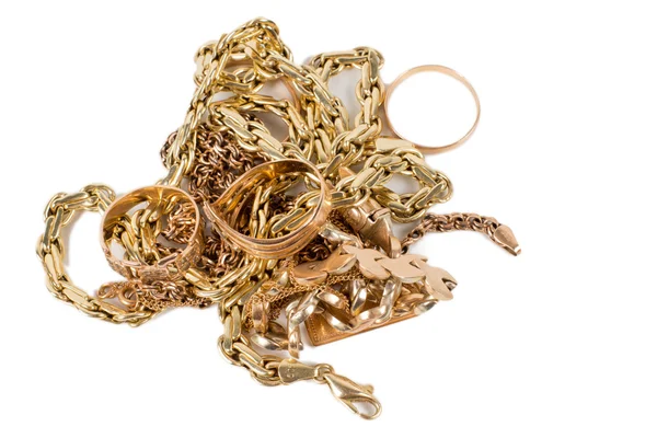 Hromady zlatých šperků — Stock fotografie