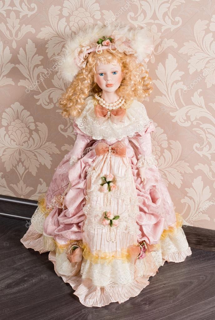 Antique doll in beautiful clothes — Stock Photo © Vaicheslav #22246055