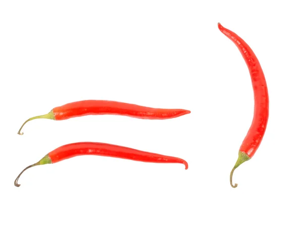 Three red chilli peppers — Stock Photo, Image