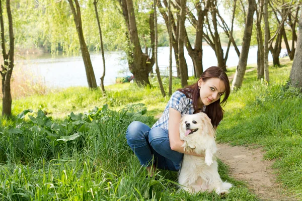 Pretty girl posing her cute little dog — Stock Photo, Image