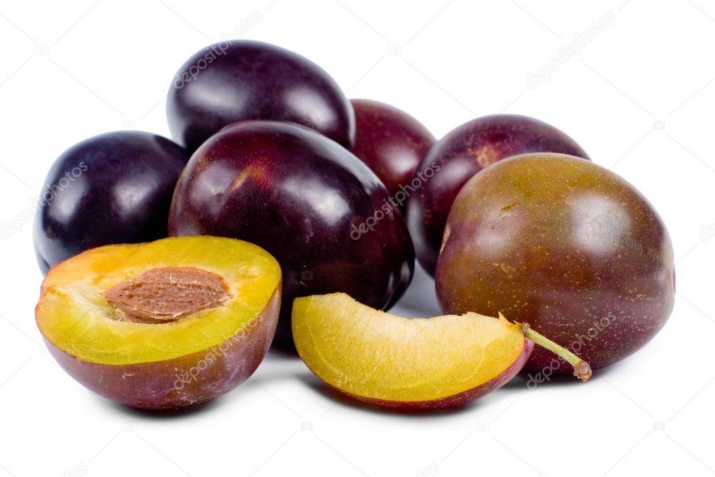 Delicious fresh whole and sliced plums