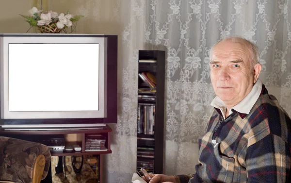 Старший чоловік дивиться телевізор — стокове фото