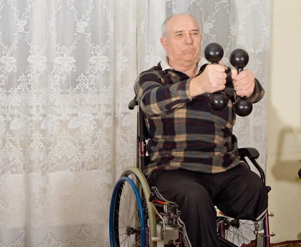 Senior handicapped man exercising — Stock Photo, Image