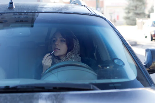 Dangerous irresponsible female driver — Stock Photo, Image