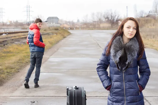 Attractive young woman waiting for a lift — Stock Photo, Image