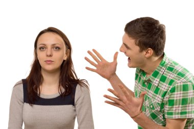 Young man gesturing at his girlfriend clipart