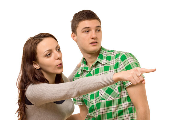 Young woman pointing excitedly with her hand
