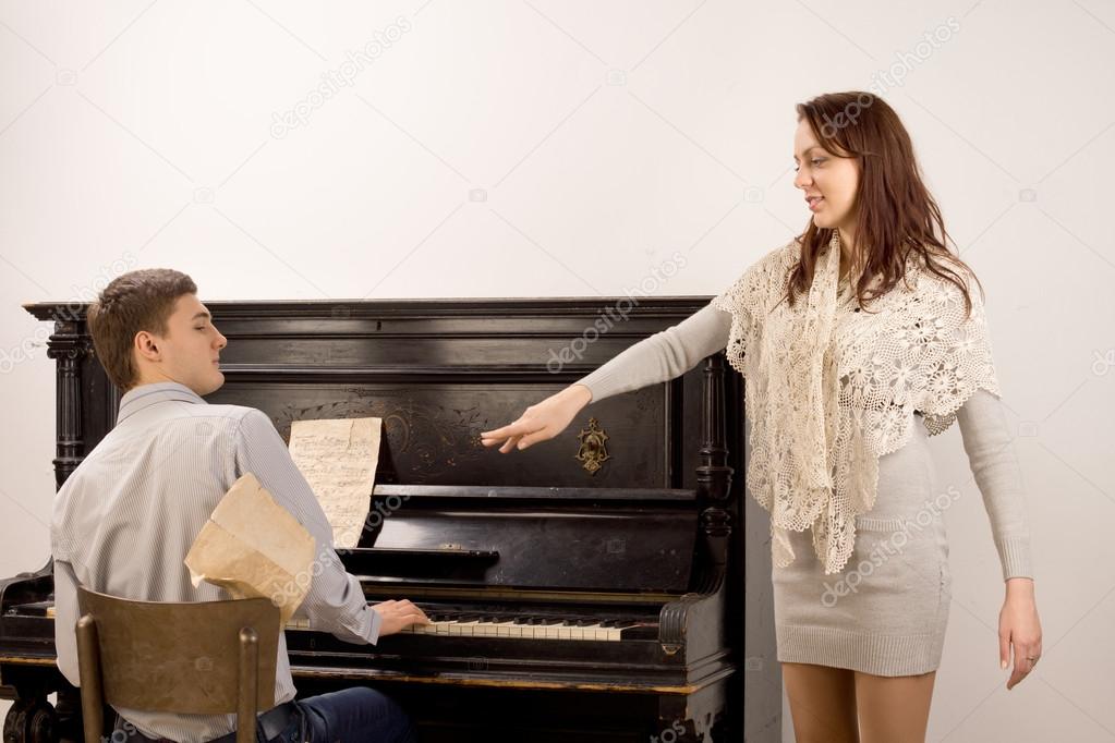 Young woman acknowledging the pianist