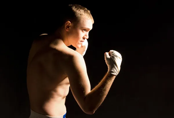 Young boxer squaring off during training — Stock Photo, Image