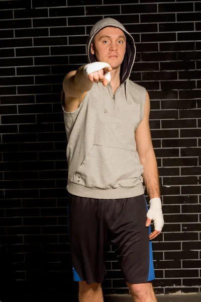 Young boxer pointing at the camera — Stock Photo, Image