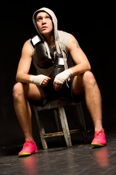 Thoughtful muscular fit young boxer — Stock Photo, Image