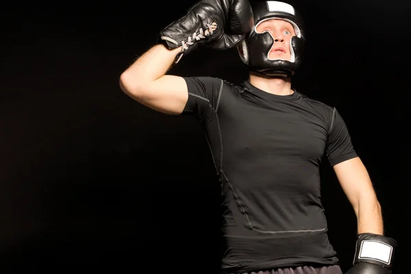 Boxer standing raising his fist to his head — Stock Photo, Image