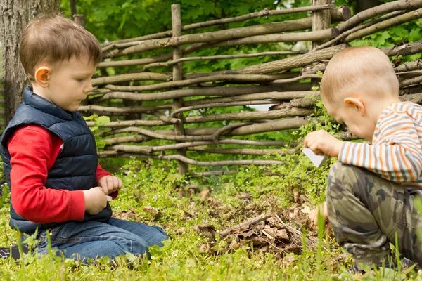 Young boys playing with matches