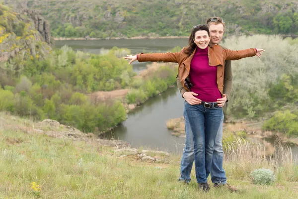 Happy romantic young couple celebrating — Stock Photo, Image