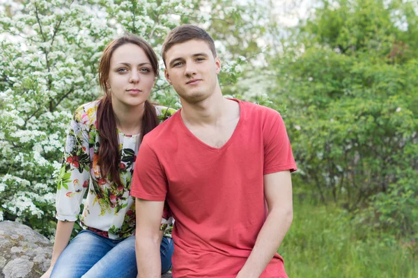 Attractive young couple on a spring walk — Stock Photo, Image