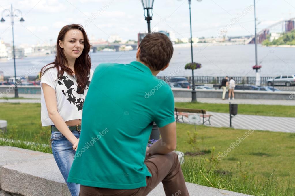 Attractive girl chatting to her boyfriend