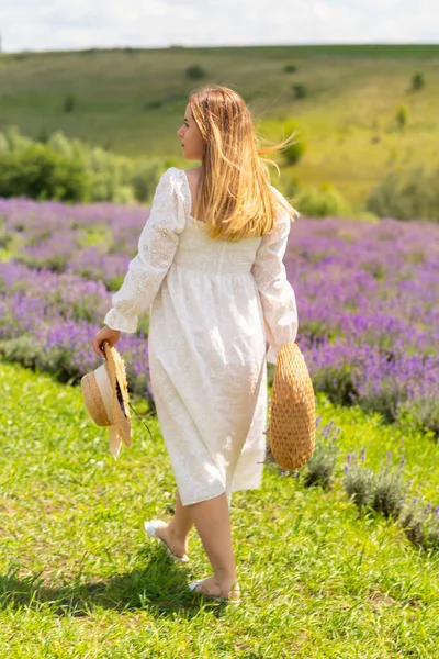 Blond Woman White Summer Dress Walking Purple Lavender Bushes Holding — Foto Stock