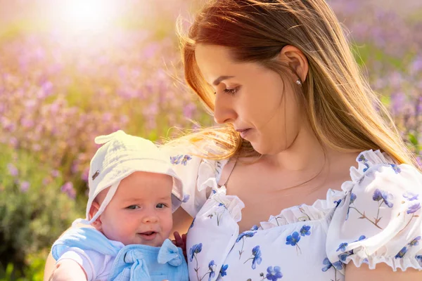Young Mother Looking Tenderly Her Little Baby Son Backlit Glowing — Stock Photo, Image