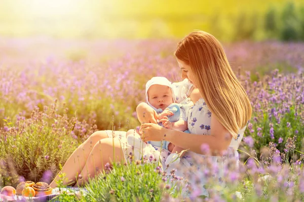 Sunset Portrait Young Mother Baby Son Relaxing Amongst Flowers Field — 图库照片