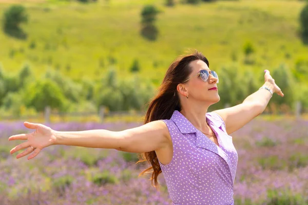 Happy Woman Rejoicing Warm Summer Weather Holding Out Her Arms — Stok fotoğraf