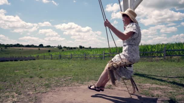 Woman Relaxing Rural Swing Evening Light Enjoying Quietude Countryside Side — Video