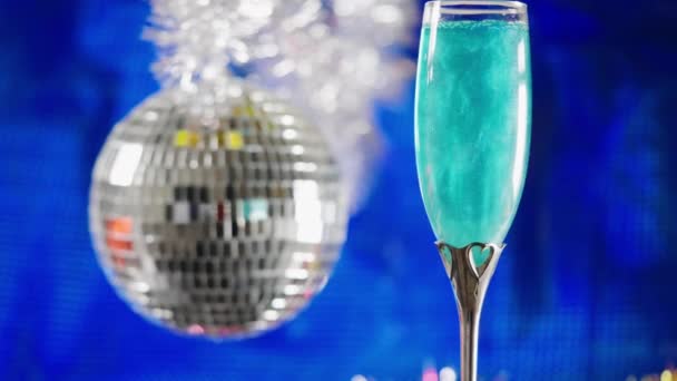 Bubbling Glass Luxury Blue Champagne Stylish Flute Glass Blue Background — Stok video