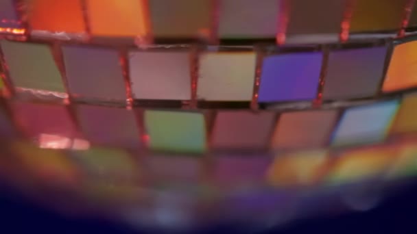 Close Detail Facets Disco Ball Christmas Ornament Reflecting Multiple Colors — Wideo stockowe