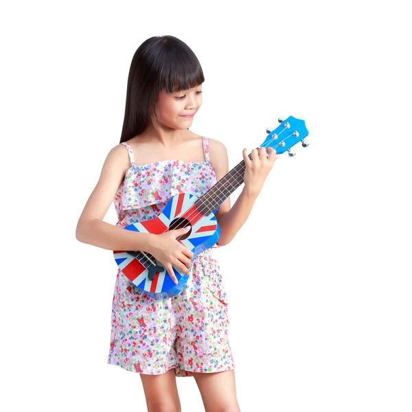 Liten asiatisk tjej med ukulele — Stockfoto