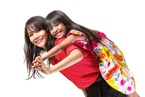 Mère et fille heureuses jouant — Photo