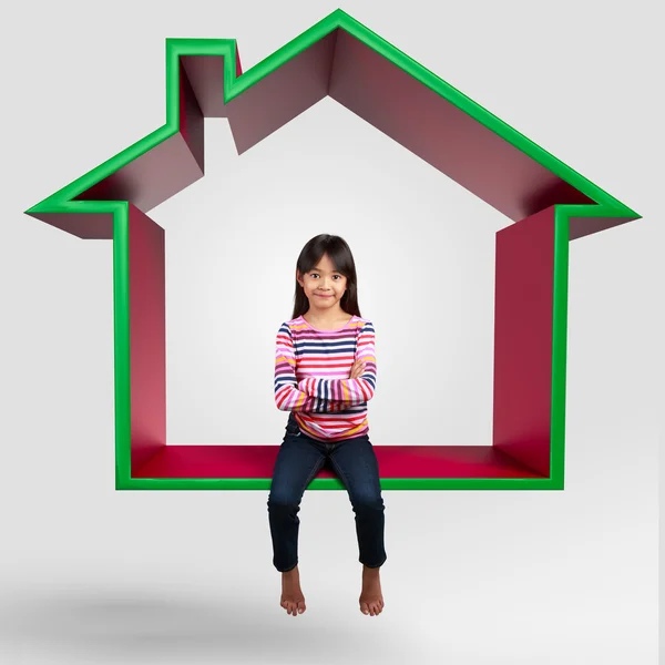 Little asian girl sitting on virtual home 3D — Stock Photo, Image