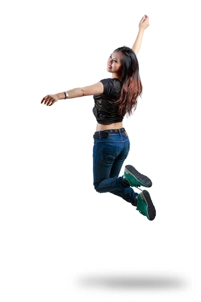 Attraente giovane donna che salta in aria — Foto Stock