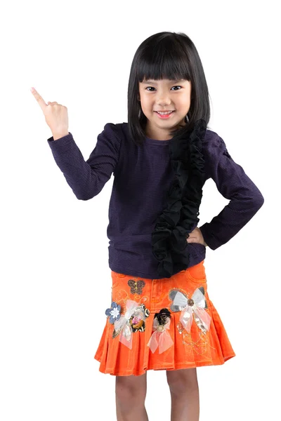 Little asian girl standing with index finger up — Stock Photo, Image