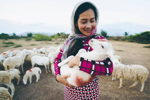 Female Shepherd Holding Little Sheep — Stockfoto