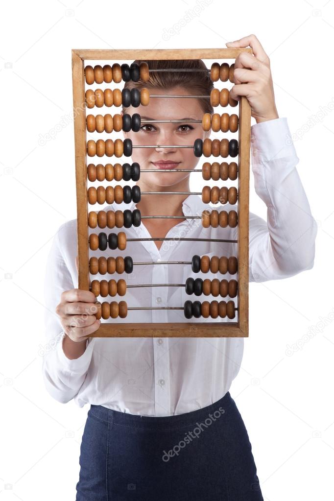 Girl holds in front of abacus