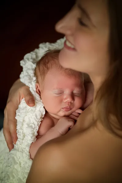 Mother holding a baby sleep Stock Image