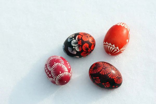 Group of Easter eggs on snow — Stock Photo, Image