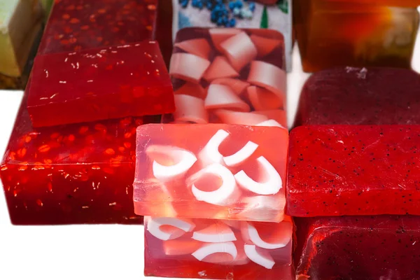 Red homemade soap bars in the market
