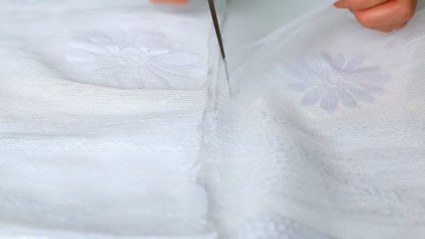 Cutting fabric with scissors — Stock Video