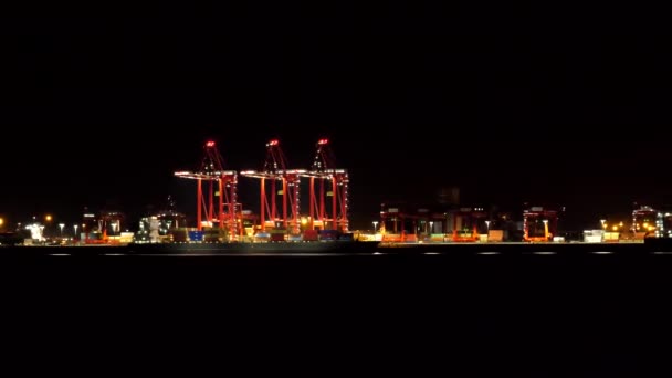 Panning Shot Illuminated Red Crane Port Liverpool City Skyline Night — Stok Video