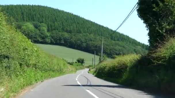 Car Windscreen View Driving Downhill Road A44 South Wales Summer — Stock Video