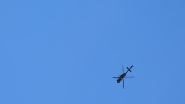 Police Helicopter Clear Blue Sky Turning Flying Away — Vídeo de Stock