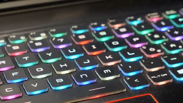 Handheld Camera View Dirty Multi Coloured Gaming Keyboard Keys Backlit — Vídeo de Stock
