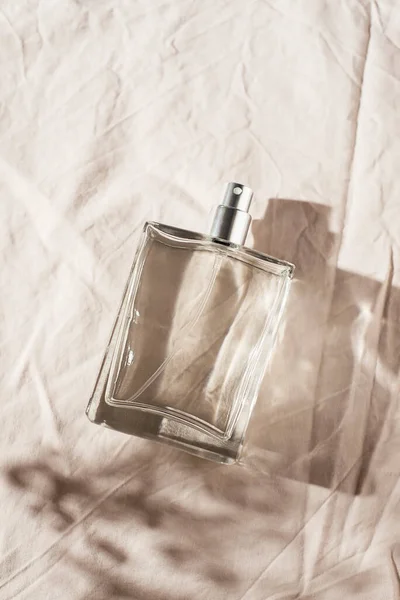 Transparent Bottle Perfume Light Grey Fabric Background Fragrance Presentation Daylight — Stock Photo, Image