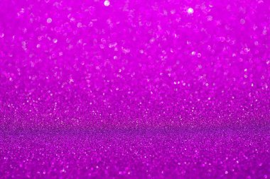Mor parıltı yüzeyi. Yumuşak odak içinde mor ışıltılı arka plan. Işıl ışıl parlayan kağıt. Noel veya Sevgililer Günü için dekorasyon için duvar kağıdı dokusu