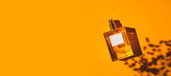 Transparent Bottle Perfume Orange Background Fragrance Presentation Daylight Trending Concept — Stock Photo, Image