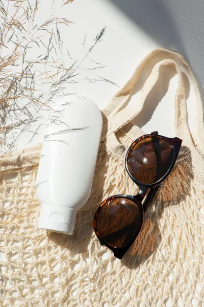 Plastic White Tube Cream Lotion Sunglasses Loth Shopping Bag Sunscreen — Stok fotoğraf