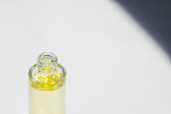 Open Transparent Bottle Cap Serum Essential Oil Soft Focus White — Stock Photo, Image