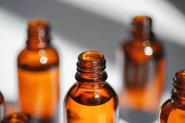 Open Amber Bottle Serum Essential Oil White Background Daylight Beautiful —  Fotos de Stock