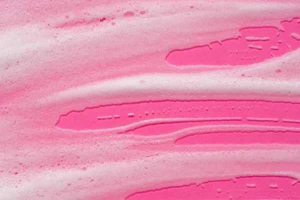 Pembe Arka Planda Köpük Örneği Köpüklü Sabunlu Sıvı Doku Doğal — Stok fotoğraf