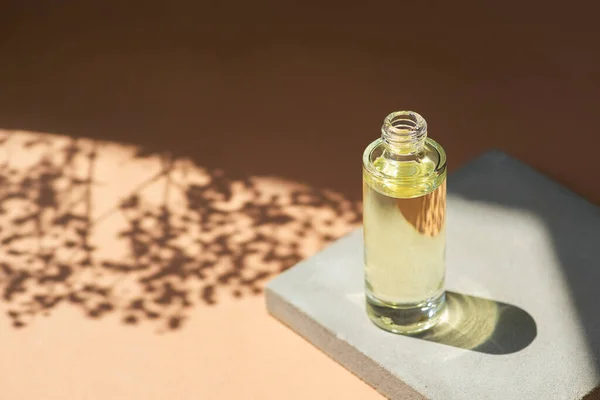 Open Transparent Bottle Dropper Pipette Serum Essential Oil Flowers Shadows — Zdjęcie stockowe